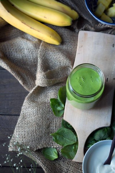 This is the BEST green smoothie i it's sweet, healthy and filling. Ingredients include bananas, yogurt, pineapple, mango and spinach (which you cannot taste)! Get the recipe from SavorySimple.net.