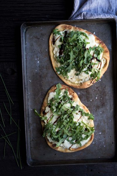 This Three-Cheese Naan Pizza with Arugula and Balsamic is perfect as a party appetizer or a quick meal! Get the recipe from Savory Simple.