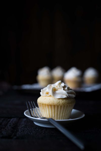 These Vanilla Maple Whiskey Cupcakes are a boozy delight, with a buttery maple center and a vanilla whiskey buttercream. Get the recipe from Savory Simple!