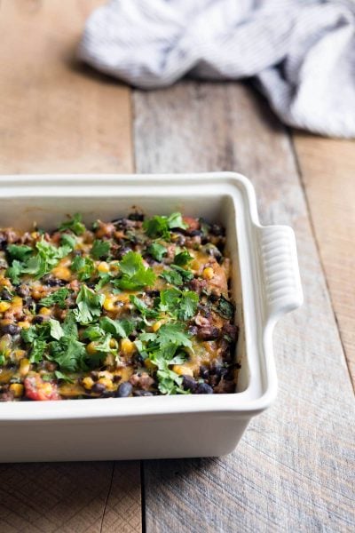 This cheesy chorizo tortilla casserole is perfect for family meals or dinner parties! Leftovers freeze beautifully. Get the easy-to-follow recipe from Savory Simple.