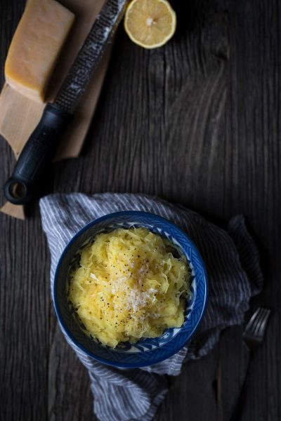This baked spaghetti squash with butter, parmesan and lemon is a simple, seasonal side dish! It involves very little hands on time so you can focus on preparing the rest of the meal.