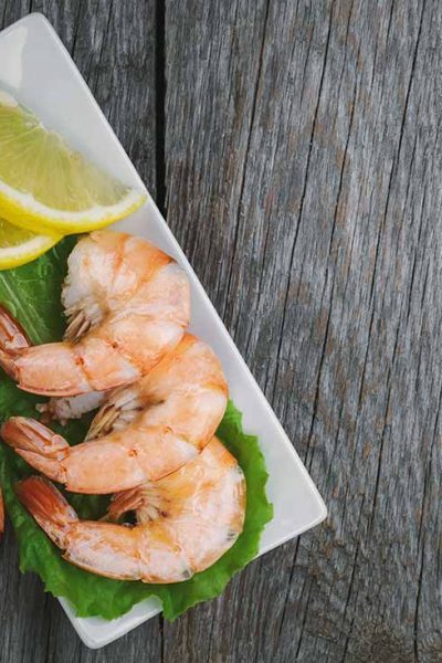 Shrimp on a plate with lemon - Shrimp Sizes and Counts Per Pound