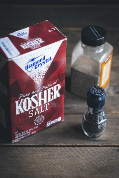 Salt and pepper to taste - a box of salt and a pepper mill